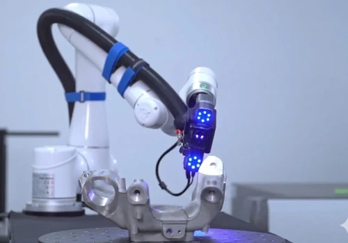 Un scanner 3d Simscan utilisé dans un système automatisé AM-DESK